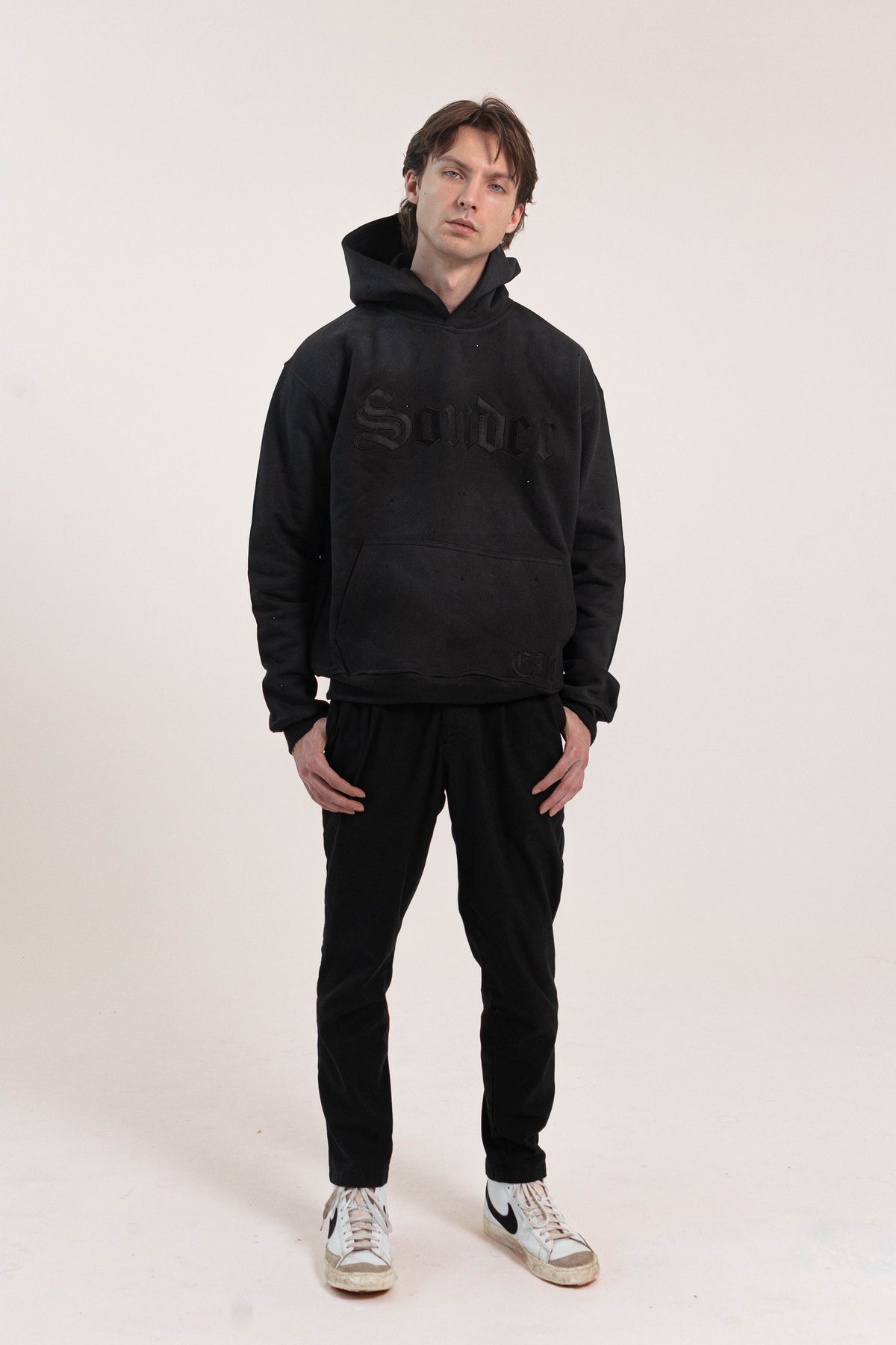 Sonder Rhinestone Hoodie in Washed Black - full body on model