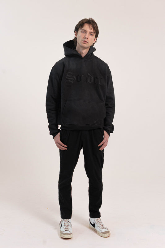Sonder Rhinestone Hoodie in Washed Black - full body on model
